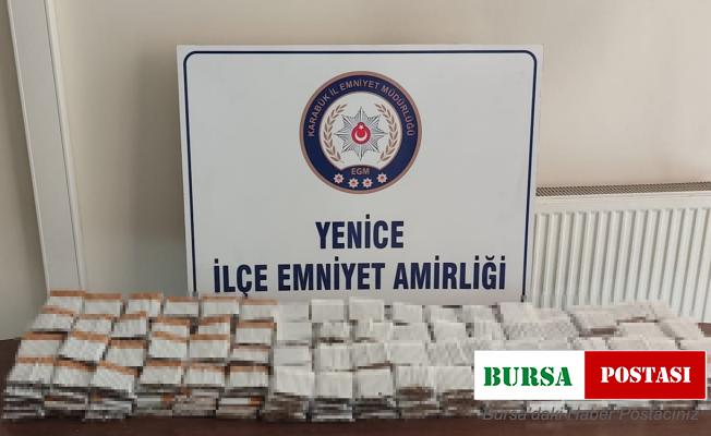 Terk edilmiş araçta bandrolsüz sigara ele geçirildi